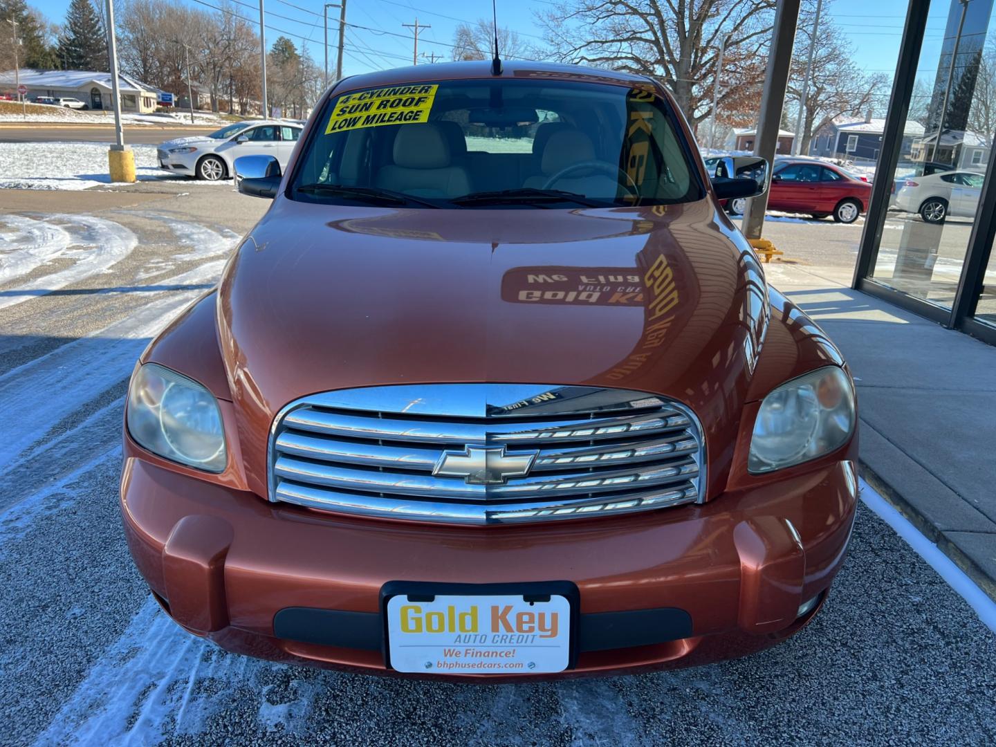 2006 Sunburst Orange II Metallic Chevrolet HHR LT (3GNDA23PX6S) with an 2.4L L4 DOHC 16V engine, 5-Speed Automatic transmission, located at 1633 W Kimberly, Davenport, IA, 52806, (563) 323-5341, 41.559456, -90.598732 - Photo#2